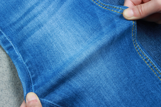 UFの粗紡糸58/59"が付いている10.2 Ozの伸張のデニムの生地原料の習慣