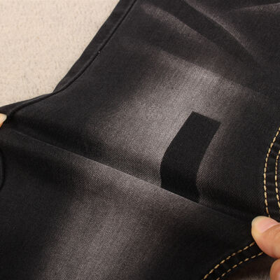 お買い得 高ストレッチ硫化黒色婦人用ジーンズデニム生地 工場価格で9.5オンスで供給 オンライン